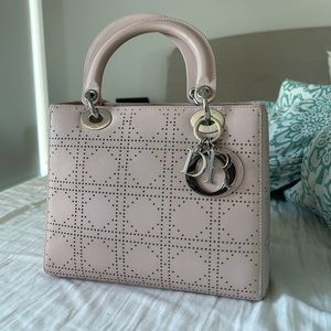 Medium lady Dior bag in light pink colour in excellent condition.